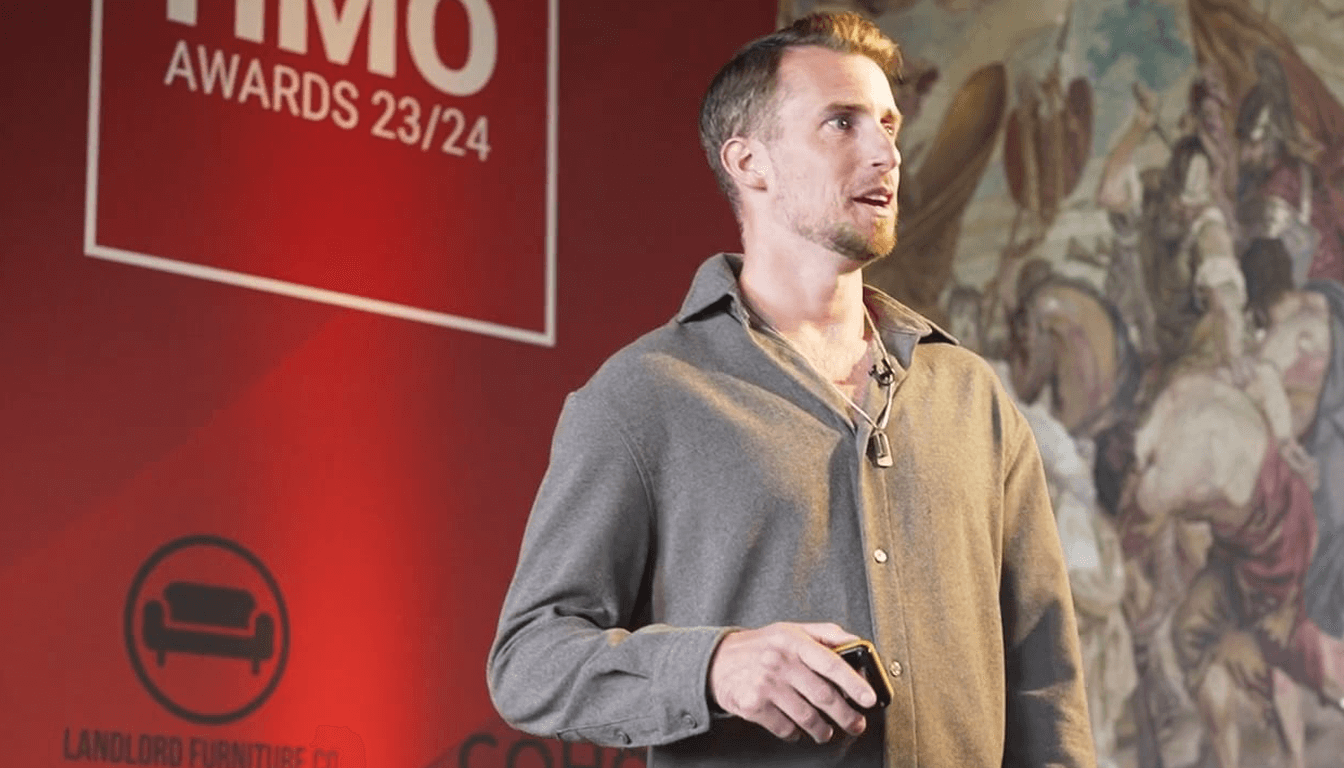 Kane Andrews speaking at the HMO Awards