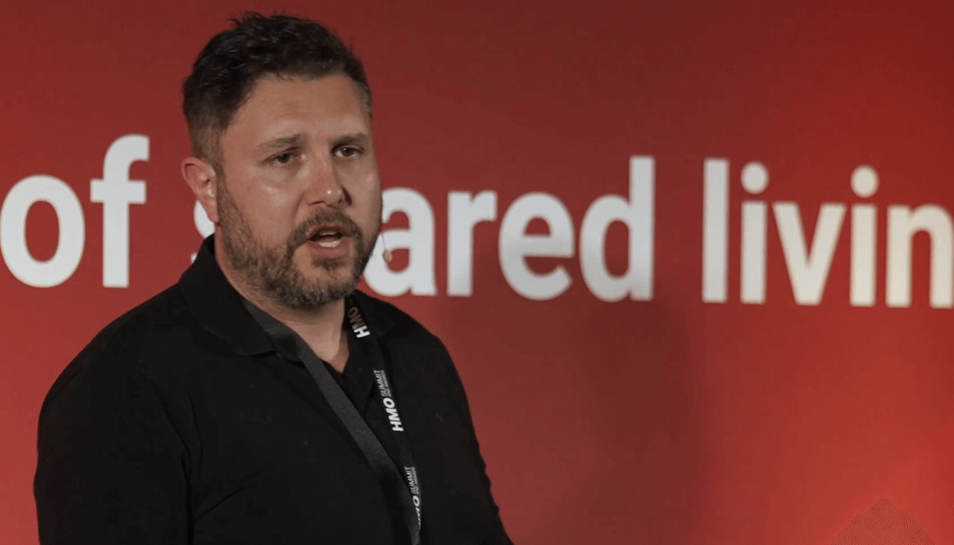 Sam Norris speaking at the HMO Summit